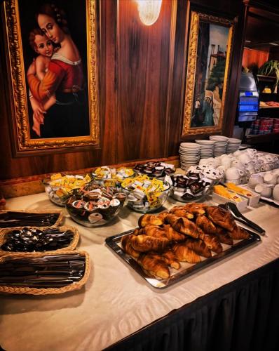 a table with a buffet of food on it at Antico Panada in Venice
