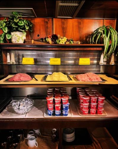 a refrigerator filled with lots of different types of food at Antico Panada in Venice