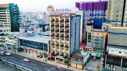 an aerial view of a city with buildings at Chungjangro Ilbeonji Boutique Hotel in Gwangju