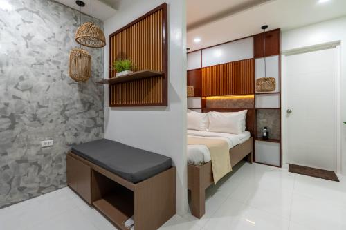 Postel nebo postele na pokoji v ubytování Serene Oasis Resort - Oslob Cebu Philippines