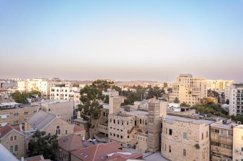 an aerial view of a city with tall buildings at Luxury 3BDR In The Heart Of Jerusalem in Jerusalem
