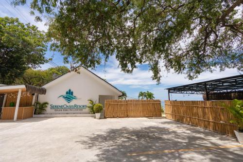 a building with a fence in front of it at Serene Oasis Resort - Oslob Cebu Philippines in Oslob