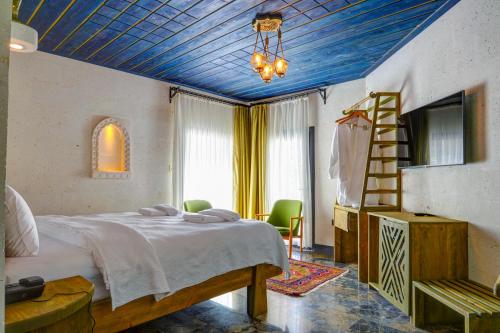 Postel nebo postele na pokoji v ubytování Motif Art Cappadocia