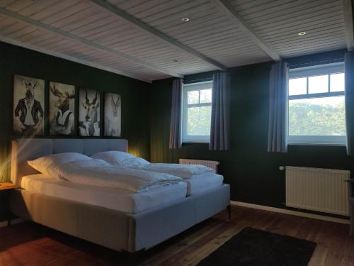 Postel nebo postele na pokoji v ubytování FeWo - Dat tweete Tohuus - Im Herzen der Lüneburger Heide