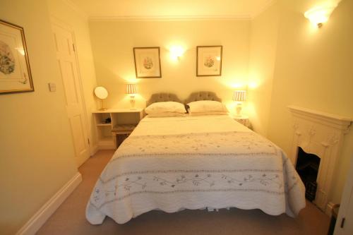 Ένα ή περισσότερα κρεβάτια σε δωμάτιο στο Hurlestone Apartment