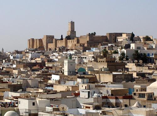 a view of a city with a tall building at Tiziri in Sousse