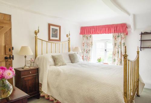 Katil atau katil-katil dalam bilik di Bratton Mill Farmhouse