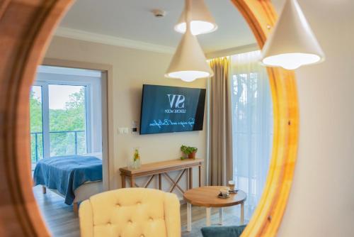 Postel nebo postele na pokoji v ubytování Hotel Szerokie Wody Sea & Sand Ustka