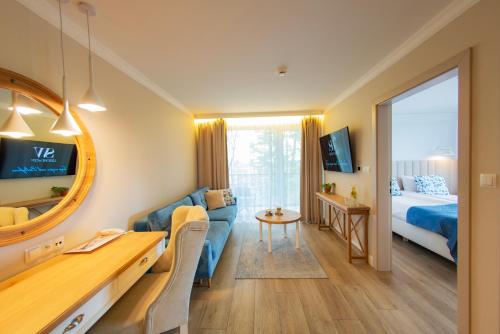 TV a/nebo společenská místnost v ubytování Hotel Szerokie Wody Sea & Sand Ustka