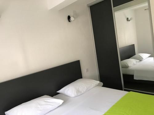 Una cama o camas en una habitación de Apartment K2