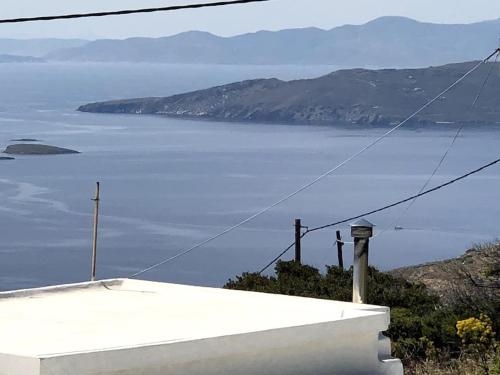 a view of a body of water from a house at Endless Bleu Villa Andros Island in Apróvaton