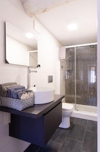 a bathroom with a sink and a toilet at Da Antonio in Biassa