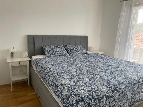 Postel nebo postele na pokoji v ubytování Apartment Sky