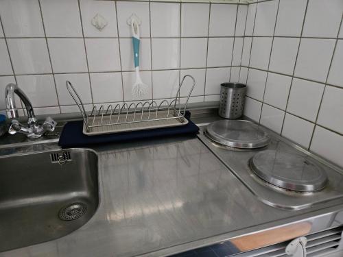 Kuchyň nebo kuchyňský kout v ubytování Miky Home