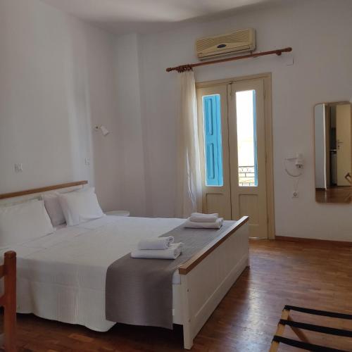 Ένα ή περισσότερα κρεβάτια σε δωμάτιο στο Anastasia Hotel