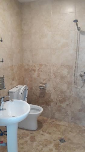 Koupelna v ubytování Hotel Marinus