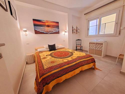 Ένα ή περισσότερα κρεβάτια σε δωμάτιο στο Casa Michela