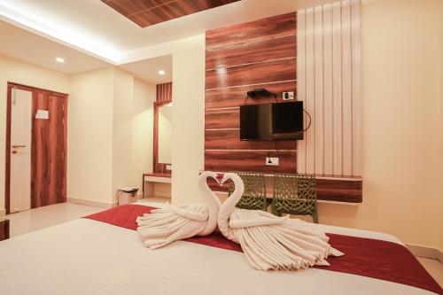 Giường trong phòng chung tại City Guest House