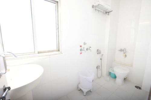 Ένα μπάνιο στο Ganpati Hotel
