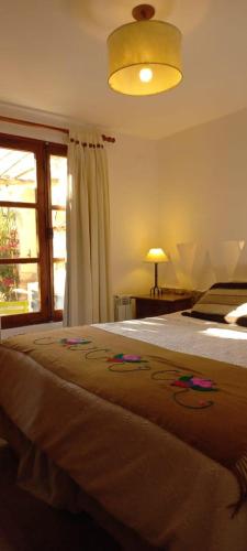 Кровать или кровати в номере Los Arcabuceros Casa Hotel Boutique