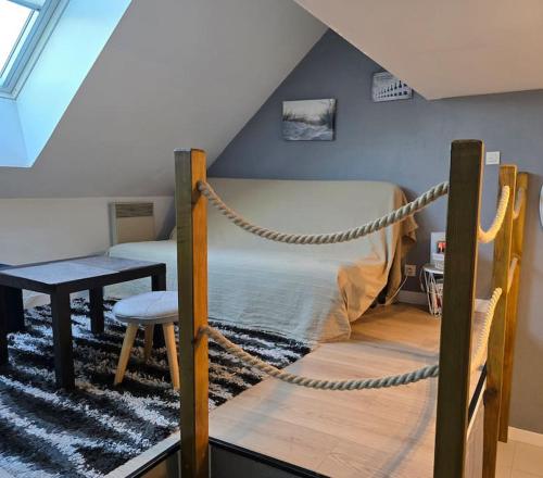 Postel nebo postele na pokoji v ubytování Appartement vue mer en duplex.