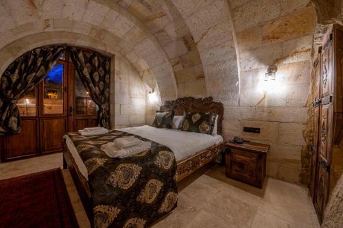 Un ou plusieurs lits dans un hébergement de l'établissement Capp Royal Cave HOTEL