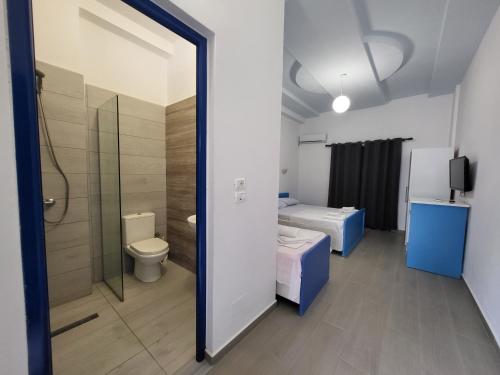 Ванная комната в Itaka Hotel Lukova