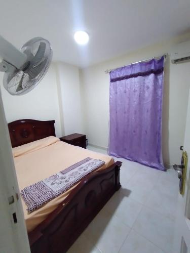 Кровать или кровати в номере شقة 2 غرفة بتكييف