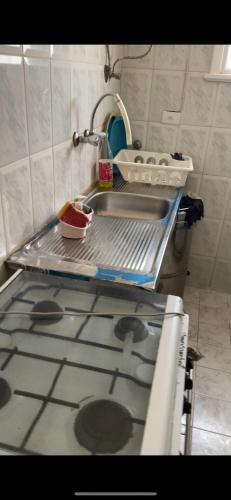 a kitchen with a sink and a counter top at شاليه مرسي مطروح قرية السعودية in Marsa Matruh