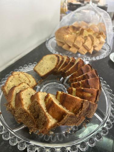two slices of bread on a plate on a table at Nautillus Hotel in Parnaíba