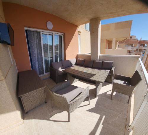 En balkon eller terrasse på Apartamento Turquesa La Manga