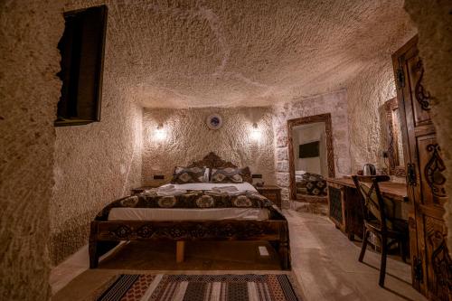 Un ou plusieurs lits dans un hébergement de l'établissement Capp Royal Cave HOTEL
