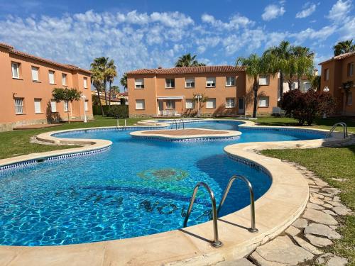 Piscina de la sau aproape de Apartment Sevilla III Golf ,big pool and seaside