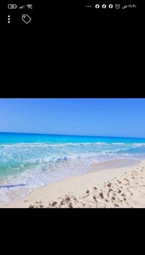شالية ارضى فندقى قرية مينا 4الياحل الشمالى في الإسكندرية: صورة للشاطئ مع المحيط