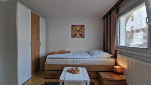 Cama ou camas em um quarto em homy Bludenz Downtown Suites