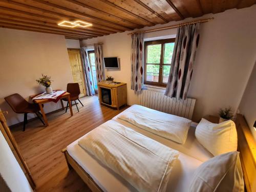 Postel nebo postele na pokoji v ubytování Pension Sydler