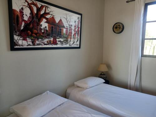 Cama o camas de una habitación en Maison D'hôtes, SPA et YOGA Villa Océane