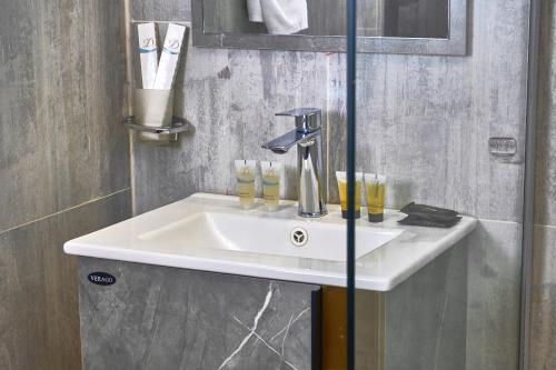 Koupelna v ubytování Myrtle Hotel Al Shohadaa