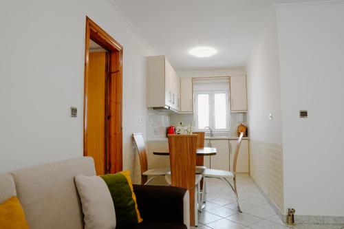 Кухня или мини-кухня в Arsi Apartament
