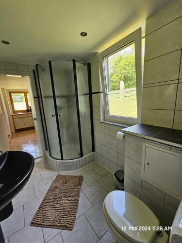 Koupelna v ubytování Bungalow ,, Zur langen Heide,,