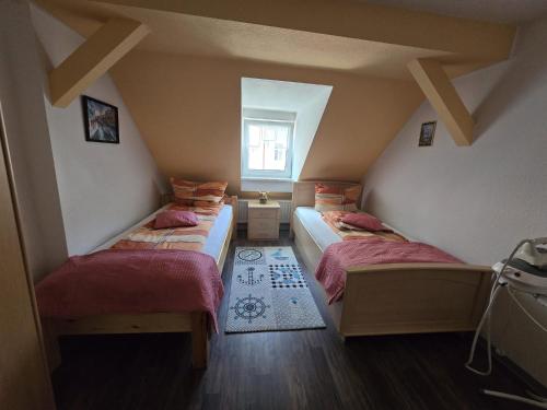 Voodi või voodid majutusasutuse Ferienwohnung Flonta toas