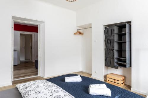 Voodi või voodid majutusasutuse Bled Castle Street Apartments toas