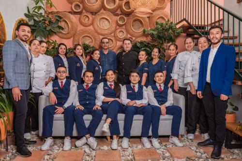 a group of people are posing for a picture at Sie Casa Hotel in Villa de Leyva