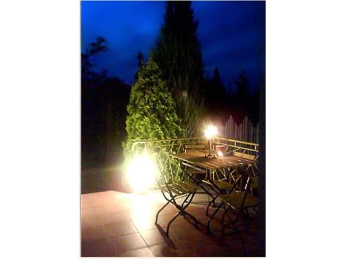 En have udenfor Romantikus Házikó a Dunánál