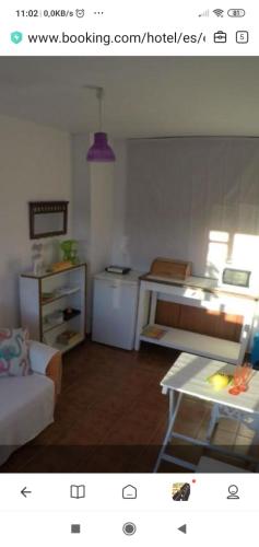 En eller flere senge i et værelse på B&B Nerja