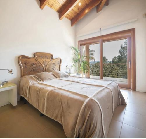 A bed or beds in a room at Villa Barcelona