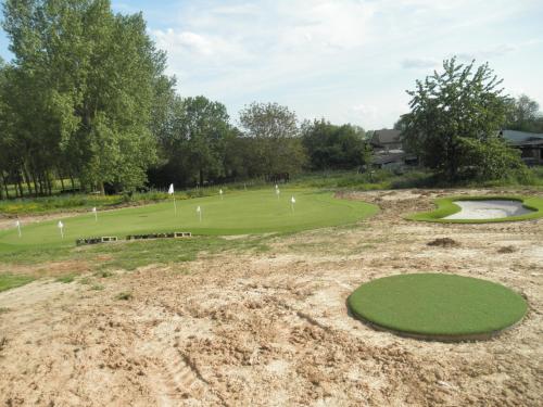 a view of a golf course with a green at Le Paradis d'Henri in Hannut