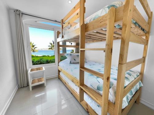 Postel nebo postele na pokoji v ubytování Puerto Velero Primera Línea Primer Piso al lado de la Playa! 8pax