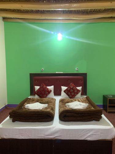 OMBAY GUESTHOUSEにあるベッド