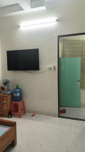 En tv och/eller ett underhållningssystem på Quy Nhơn Apt